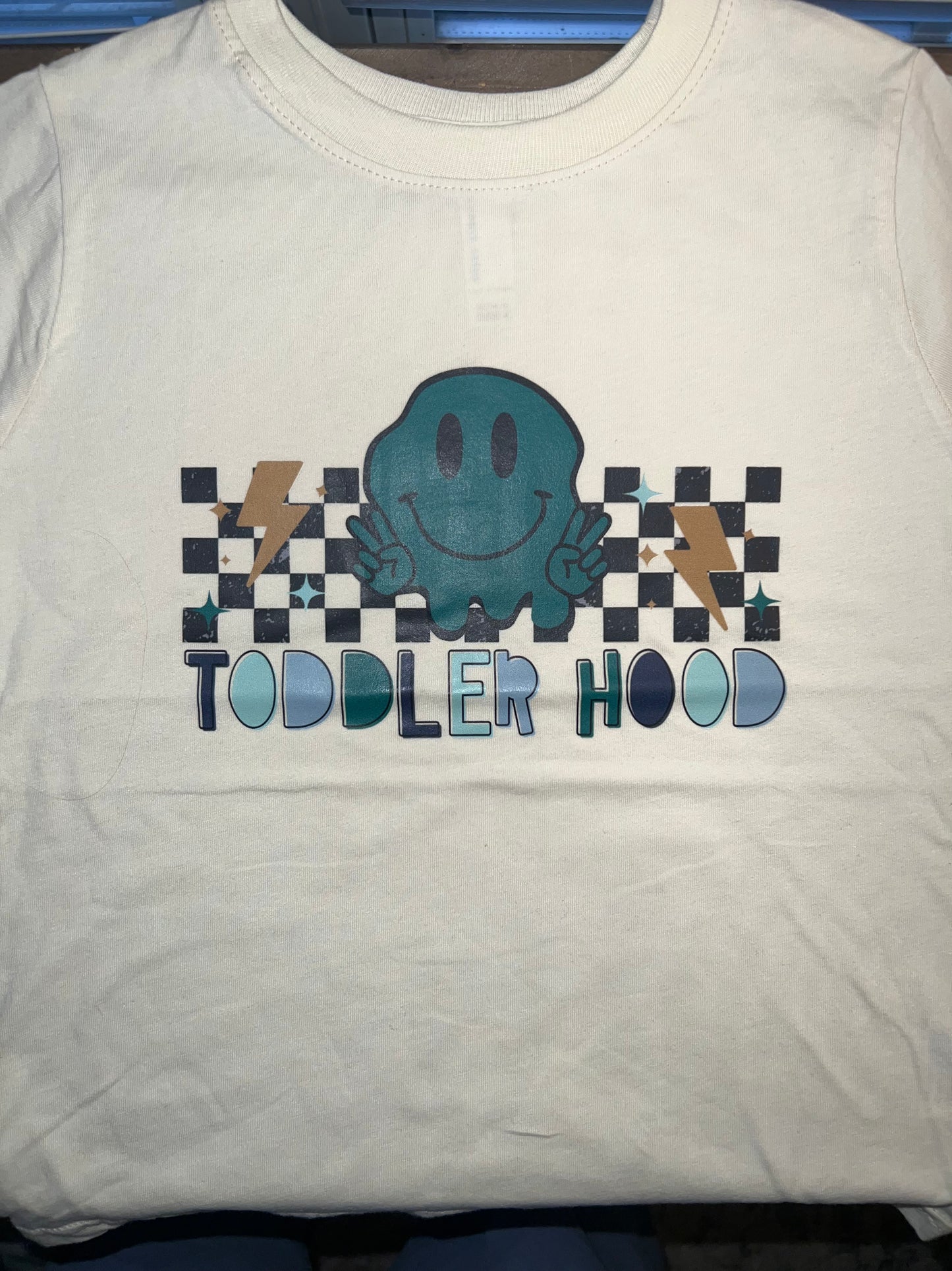 Toddlerhood Tee on beige